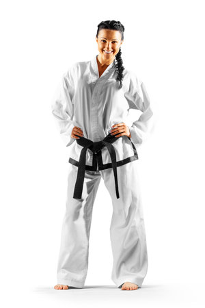 Professional female karate fighter isolated on the white backgroundの写真素材
