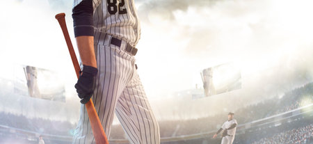 Professional baseball player in action on grand arenaの写真素材