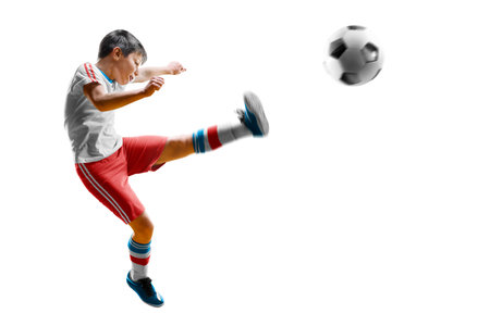 children soccer player in action isolated white backgroundの写真素材