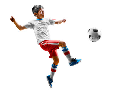 children soccer player in action isolated white backgroundの写真素材