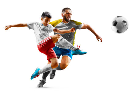 Children with adult soccer players in action isolated white backgroundの写真素材