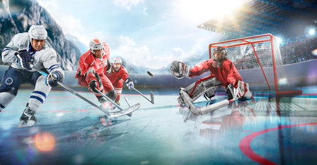 Ice Hockey Rink Arena: Professional Forward Player Masterfully Dribbles, Breaks Defenseの写真素材