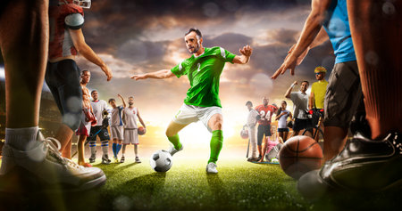 dynamic sports scene showing soccer player in action surrounded by other athletes on field at sunsetの写真素材