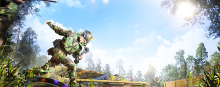 Professional paintball player in action outdoorの写真素材
