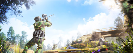 Professional paintball player in action outdoorの写真素材