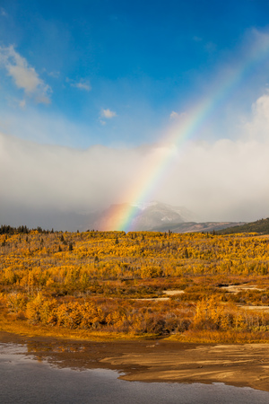 Rainbow on an autumn day near Saint Mary, Glacier National Park,の写真素材