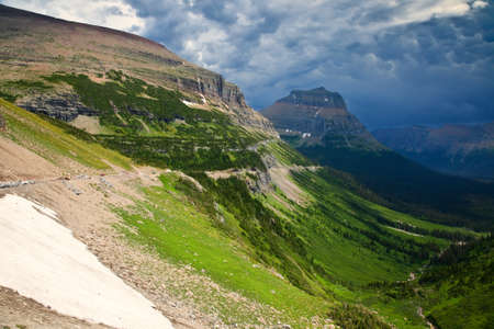 The Going-to-the-Sun road traversing the mountain slopes on the east side of Logan Pass in Glacier National Park, Montana, USA.の写真素材