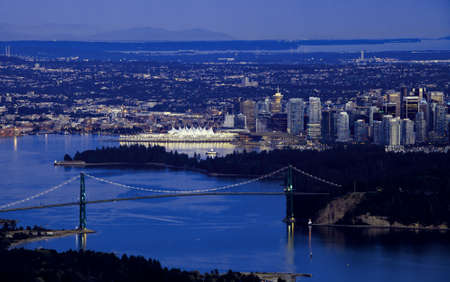 Lions Gate Bridge and Canada Place, Vancouver, British Columbia, Canadaの写真素材