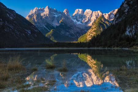 Lago di Landro is a small mountain lake in the Dolomites Mountains of Northern Italyの写真素材