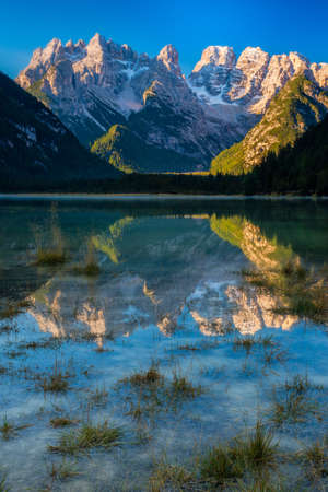 Lago di Landro is a small mountain lake in the Dolomites Mountains of Northern Italyの写真素材