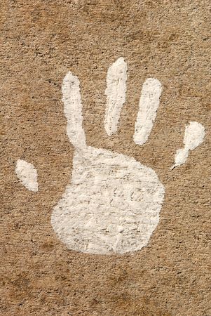 Ageing Painted Print of Child's Hand on Urban Sidewalkの写真素材