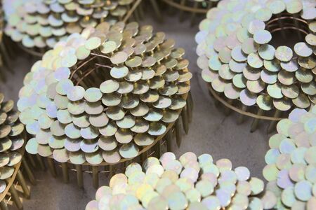 Roofing nails for a nail gun still rolled up in the box.の写真素材