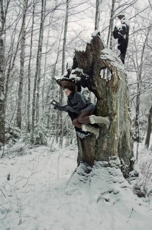 girl in forest, winter's tale, winter walk in the woodsの写真素材