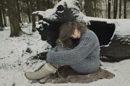 girl in forest, winter's tale, winter in the woodsの写真素材