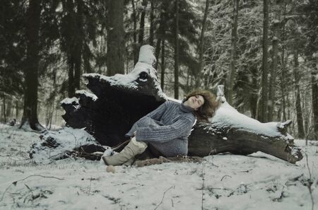 girl in forest, winter's tale, winter in the woodsの写真素材
