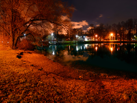 late autumn in the Park. Evening in the light of lanterns.の写真素材