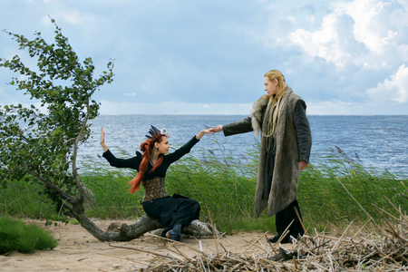 tales of north, couple in fantasy costumes on the beachの写真素材