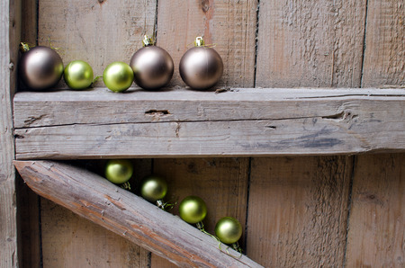 different Christmas balls on old wooden background wallの写真素材