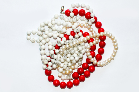 agate, Jasper and pearl beads on white backgroundの写真素材