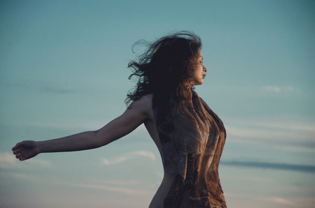 toned portrait of a young womanの写真素材