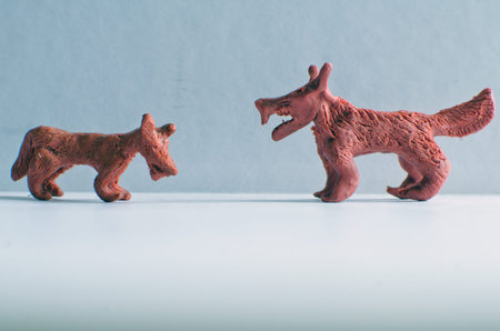 two wolves or dogs from plasticine - molded children