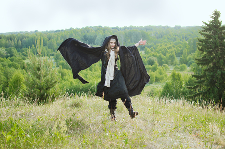 young witch fun dancing on bald mountain in the run-up to the covenの写真素材