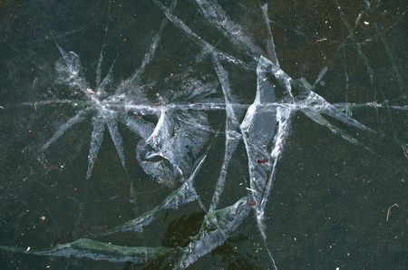 cracks on the ice surface-background imageの写真素材