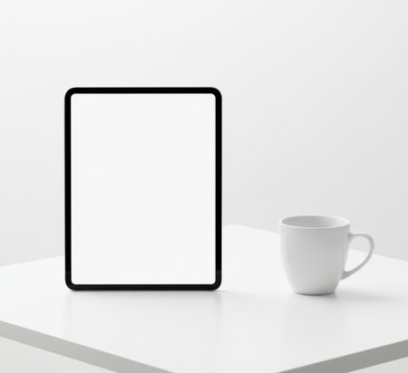 Mockup digital tablet and coffee cup on white table. 3d renderingの素材