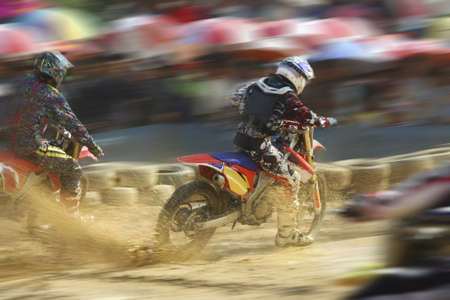 Motocross bikes racing in trackのeditorial素材