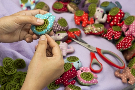 Hand sewing and cloth dolls の写真素材