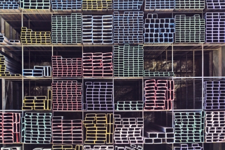 Difference sizes metal pipes for construction on shelf の写真素材