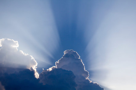 Sun rays come through clouds