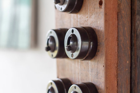 Retro style light switch on wall 