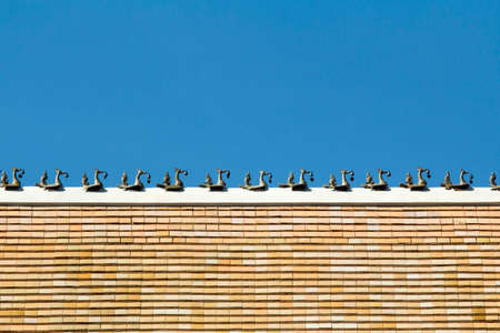 Sculpture on the roof of buddhist temple ,Chiangmai Thailand の写真素材