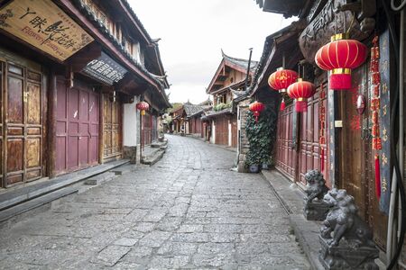 YUNNAN CHINA - JUNE 22 : Lijiang old town streets in the morning. The town be listed at the World Heritage Site in 1997. Jun 22 ,2015 in Lijiang old town ,Yunnan, China.のeditorial素材