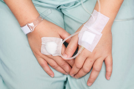 woman patient in hospital with saline intravenous iv