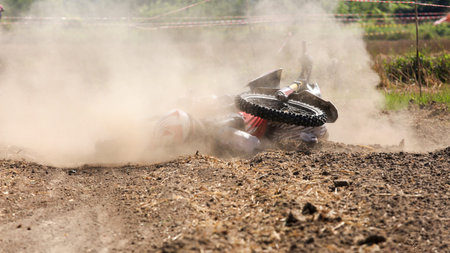 Fall of rider motocross in trackの写真素材