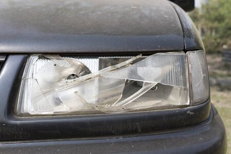 damaged car headlamp after collisionの写真素材