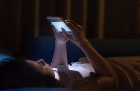 Using cell phone at night lead to blindnessの写真素材