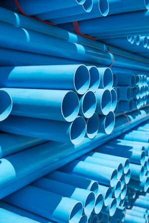 PVC pipes stacked in warehouse.の写真素材