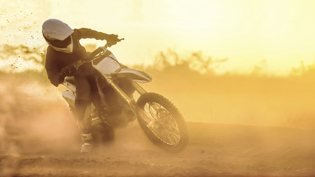 Silhouette motocross speed in trackの写真素材