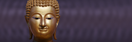 Golden Buddha statue close upの写真素材