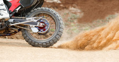 Dust splash from enduro motorcycleの写真素材
