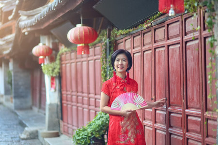 Female Tourist with Chinese Traditional Clothing in Lijiang Old town ,Yunnan, China.