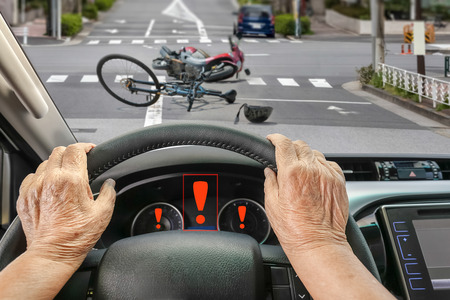 Car Accident with Senior Citizen Driver in Cityの写真素材