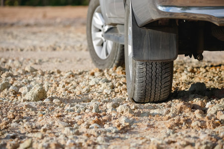 Dirt road tire on dirt track