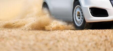 Rally race car drifting on dirt track.の写真素材
