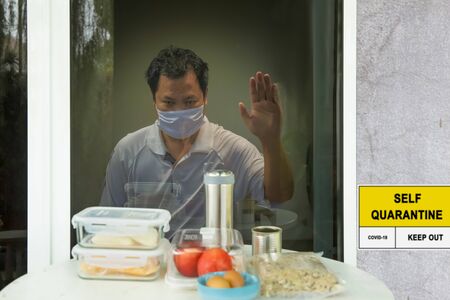 Food delivery for Self-isolation and self-quarantine to help stop the spread of coronavirus (COVID-19) , while you wait for test results.の写真素材