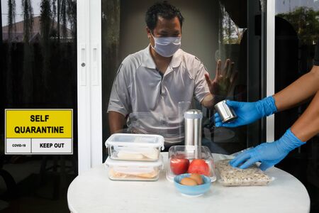 Food delivery for Self-isolation and self-quarantine to help stop the spread of coronavirus (COVID-19) , while you wait for test results.の写真素材