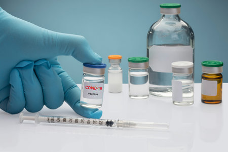 covid-19, coronavirus vaccine ampoule, bottle for injection